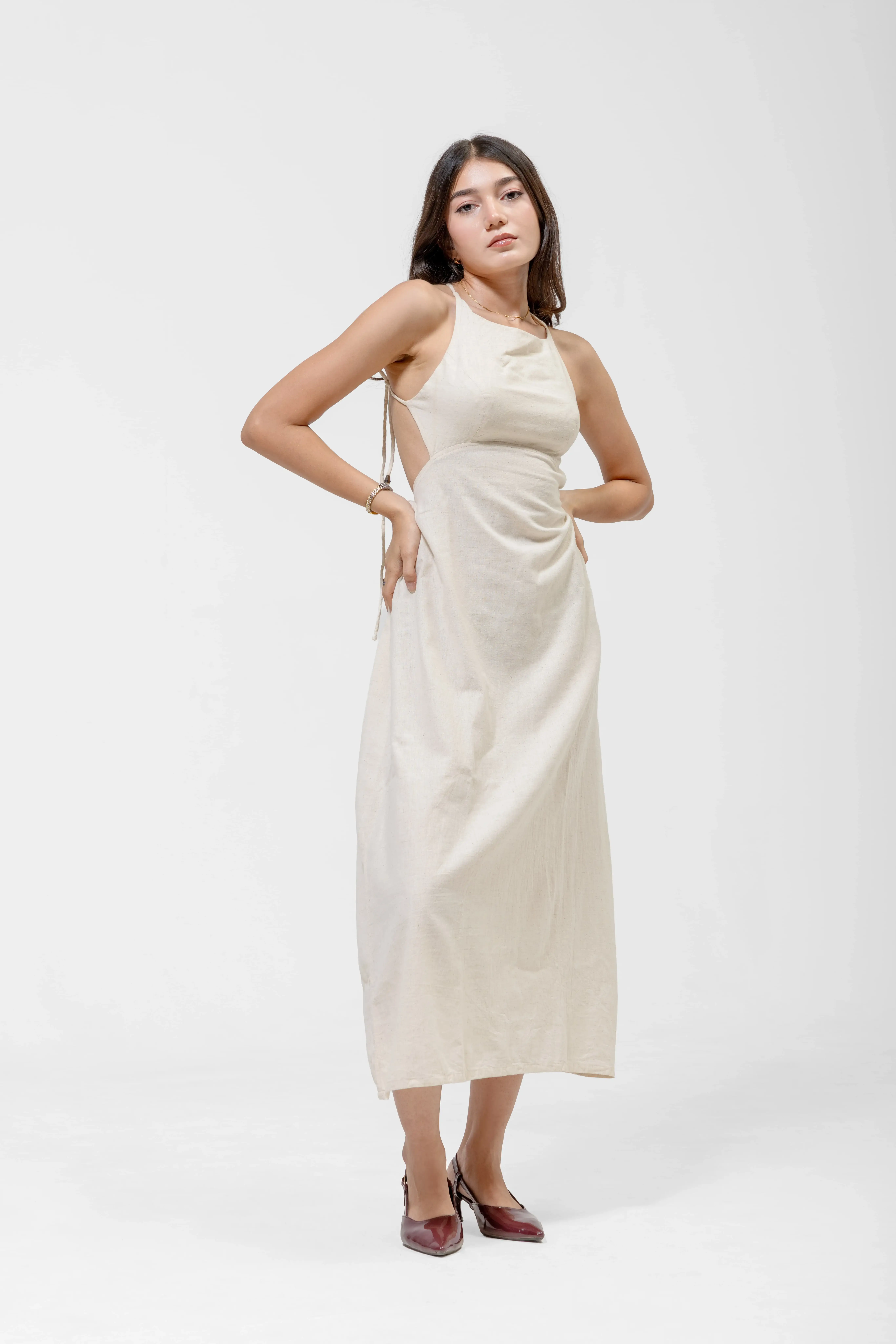 QISSEY BEIGE OPEN-BACK MIDI DRESS — view 4 — MINIMALIST MIDI DRESS DESIGNED WITH A DELICATE, STRAPPY HALTER BODICE THAT FLOWS INTO A FULL SKIRT. 