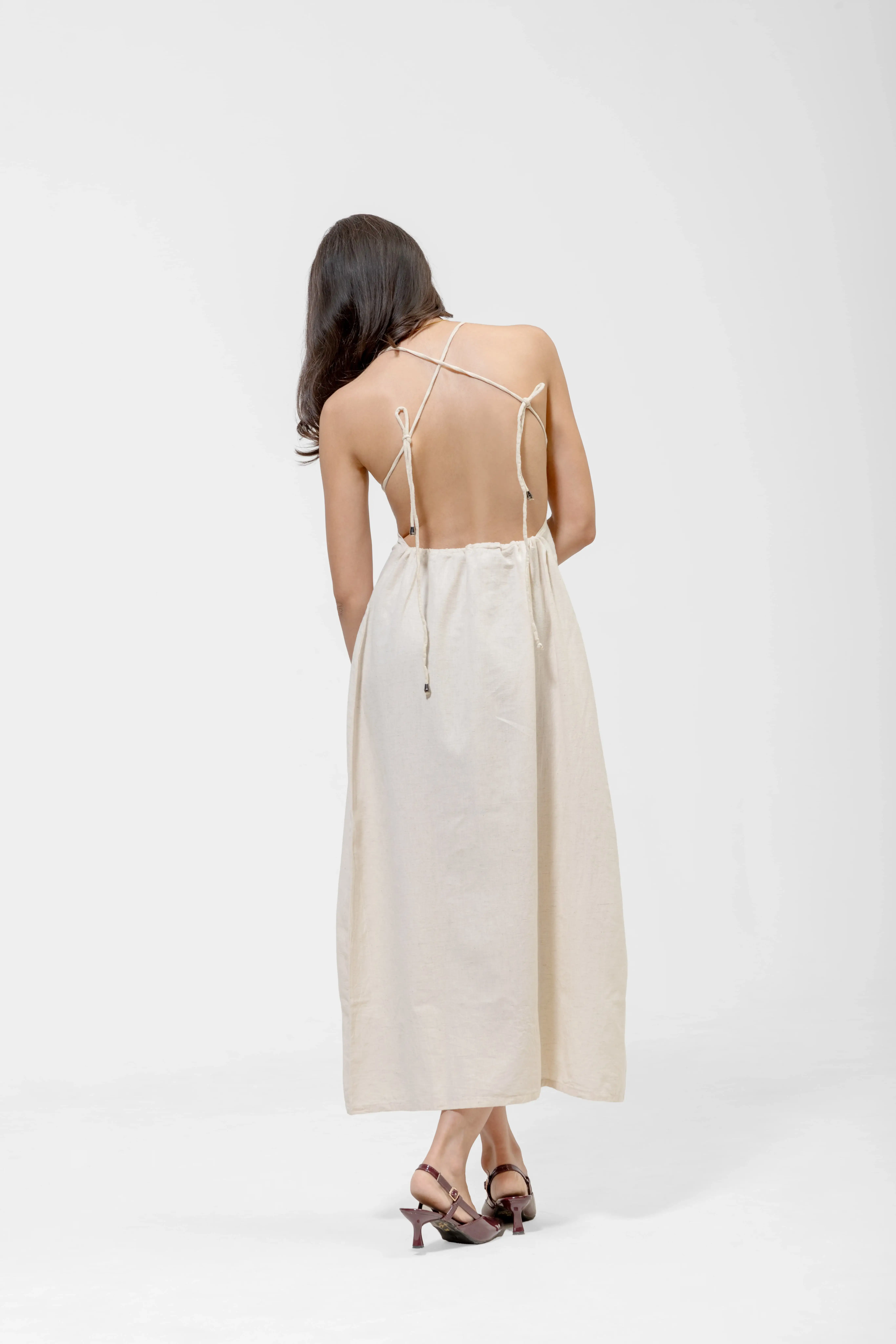 QISSEY BEIGE OPEN-BACK MIDI DRESS — view 3 — MINIMALIST MIDI DRESS DESIGNED WITH A DELICATE, STRAPPY HALTER BODICE THAT FLOWS INTO A FULL SKIRT. 